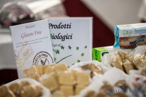 a table with some pastries and a box of cookies at Hotel Relax Roma Nord in Fiano Romano