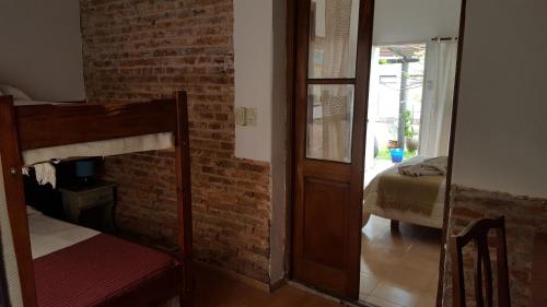 Кровать или кровати в номере Antigua Fonda Hosteria