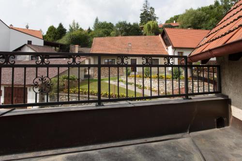 a balcony with a black iron fence at Amazing 5 bedroom house KRUMLOV 82 - 4 min walk to main square in Český Krumlov