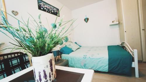 Łóżko lub łóżka w pokoju w obiekcie Apartamenty na pięterku