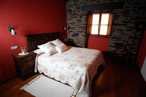 Кровать или кровати в номере Casa Xuaquin