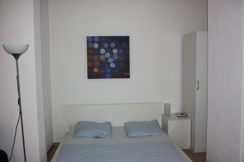 Postel nebo postele na pokoji v ubytování Swiss Star Oerlikon Station - Self Check-In