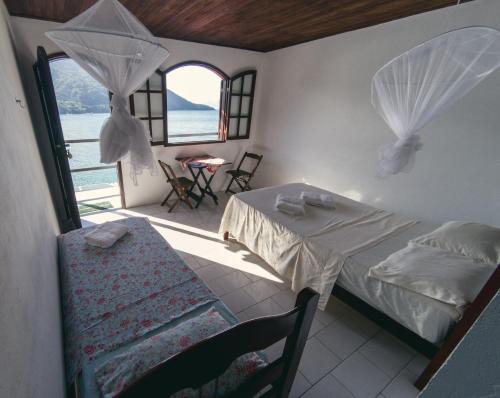 Легло или легла в стая в Pousada Toca do Mar