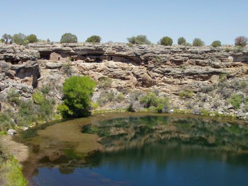 a small pond in the middle of a rocky field at Beaver Creek Inn in Lake Montezuma