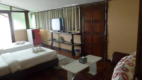 Katil atau katil-katil dalam bilik di Rao Ga Khao Resort