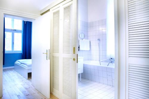 
Ein Badezimmer in der Unterkunft Hotel Pelli Hof Rendsburg by Tulip Inn

