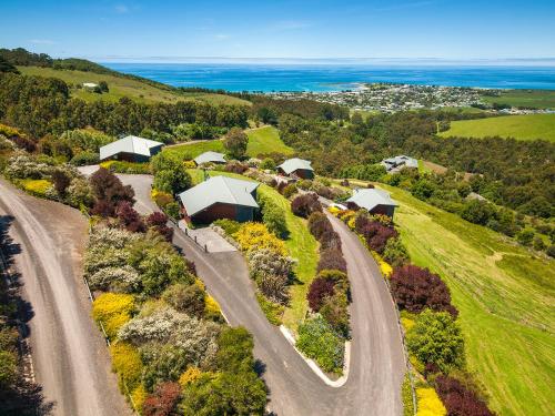 an aerial view of a road with houses on a hill at Point of View Villas in Apollo Bay