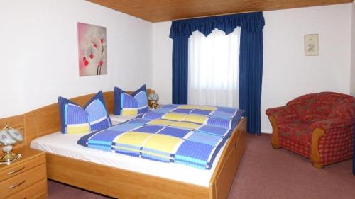 Ένα ή περισσότερα κρεβάτια σε δωμάτιο στο Gästehaus Jutta
