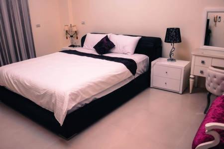 Ένα ή περισσότερα κρεβάτια σε δωμάτιο στο Chun House