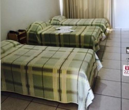 Postelja oz. postelje v sobi nastanitve Hotel Huesca