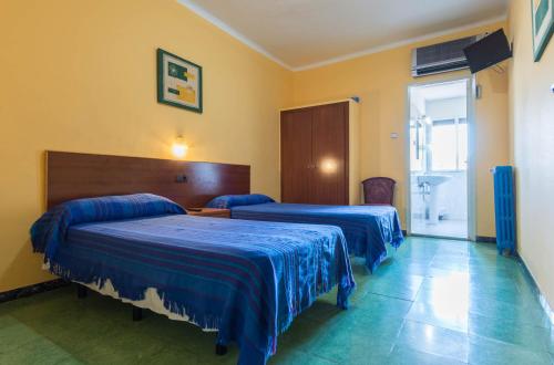 Katil atau katil-katil dalam bilik di Hostal Urgell
