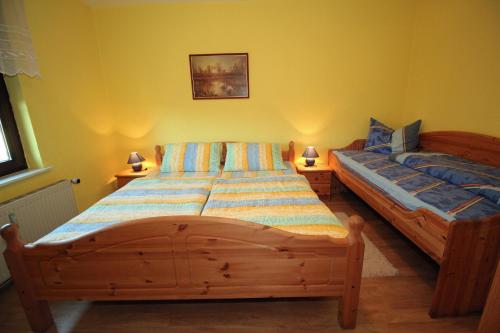 Postel nebo postele na pokoji v ubytování Ferienwohnungen Vieth