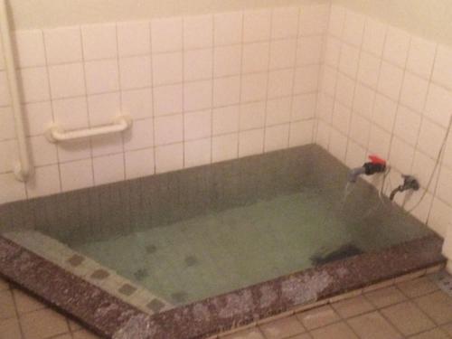 Ein Badezimmer in der Unterkunft Goroji Bekkan