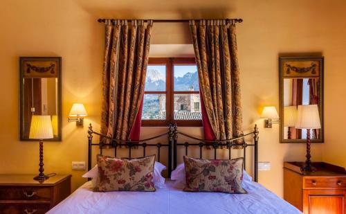 a bedroom with a bed and a window at The Salvia - Adults Only in Sóller