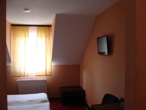 Televisyen dan/atau pusat hiburan di Hostel Lan