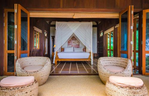 Χώρος καθιστικού στο Koh Jum Beach Villas "A member of Secret Retreats"