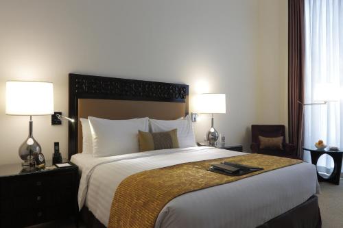 Postel nebo postele na pokoji v ubytování Fairmont Makati