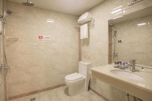 Un baño de Zhangjiajie Wangyi Inn