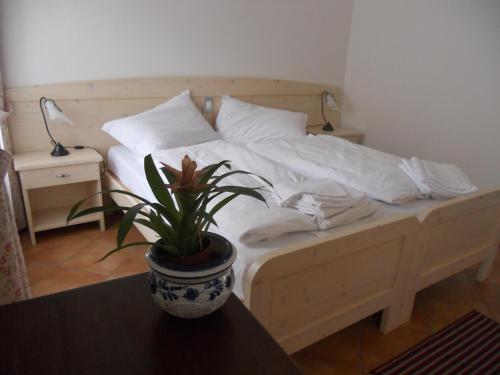Ένα ή περισσότερα κρεβάτια σε δωμάτιο στο B&B Agritur Affittacamere Capra Mauro
