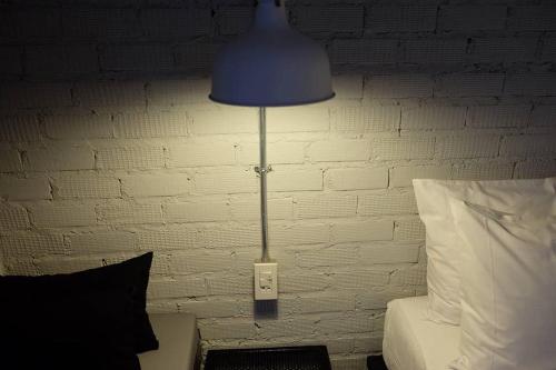 Letto o letti in una camera di Palmari Boutique Hotel