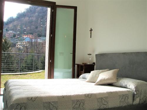 Posteľ alebo postele v izbe v ubytovaní Green & Lake Home