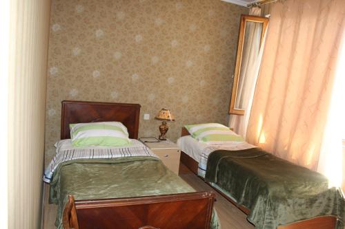 Postel nebo postele na pokoji v ubytování Nunua's Bed and Breakfast