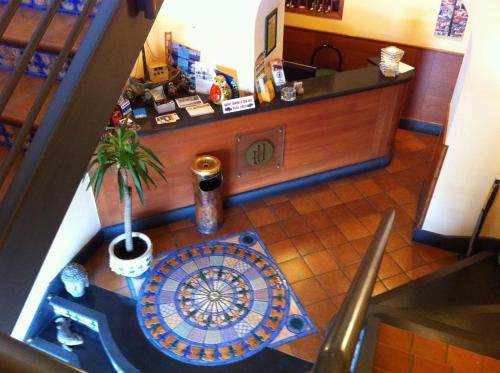 an overhead view of a counter in a restaurant at Hotel Potenza in Naples