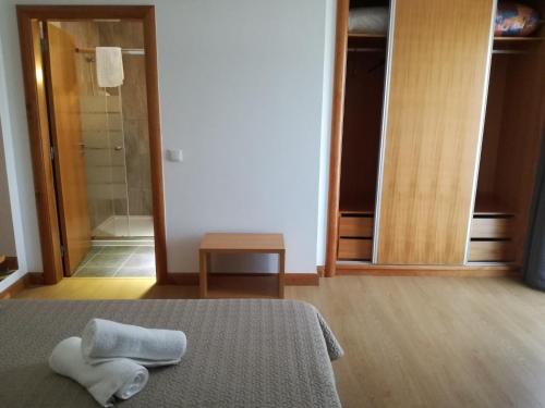 Postel nebo postele na pokoji v ubytování Casa Lagar de Pedra
