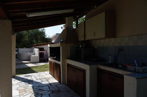 Kuchyň nebo kuchyňský kout v ubytování Anna Pousi Studios & Apartment