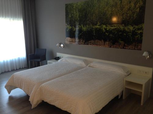 Katil atau katil-katil dalam bilik di Hotel Bodegas Traslascuestas - GRUPO PIÉROLA