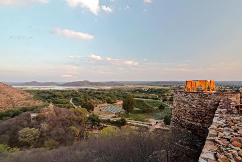 a view from the top of a building with an orange roof at Ramathra Fort in Sapotra