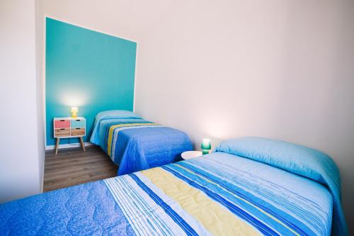 Ένα ή περισσότερα κρεβάτια σε δωμάτιο στο Residenza Borgo Valpolicella