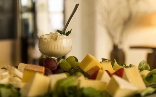 a close up of a plate of food with a dessert at Hotel Casa Magagnoli in Finale Emilia