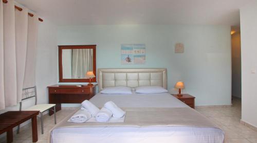 Кровать или кровати в номере Anna Maria - Vanessa Apartments