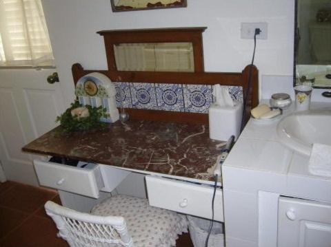 a bathroom with a sink and a counter top at Arribamar in Portobelo