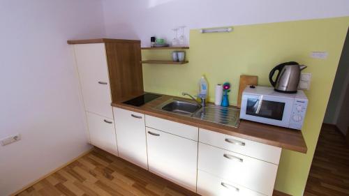 A cozinha ou cozinha compacta de Rauhbergerhof