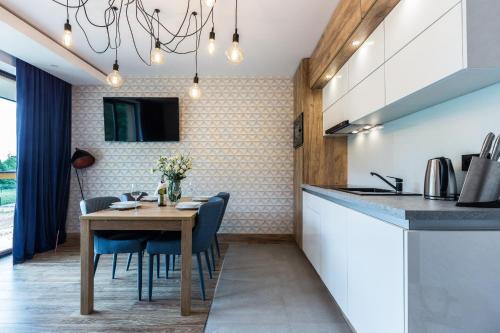 Kuchyň nebo kuchyňský kout v ubytování Aparthotel Góralski Spa & Restaurant