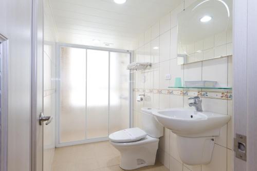 Koupelna v ubytování Songshan Hotel