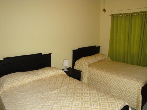 Кровать или кровати в номере Hotel Santander SD