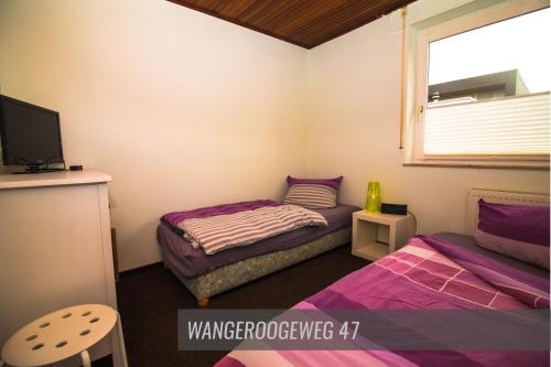 Wangeroogeweg 47にあるベッド