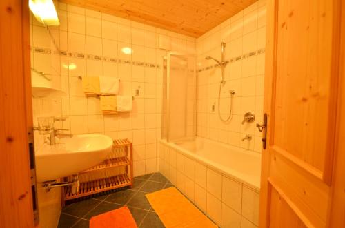 Ванна кімната в Haus Bergzauber