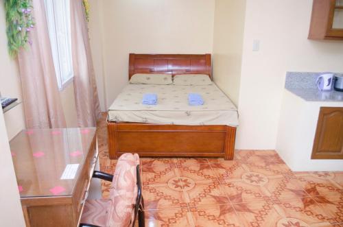 Letto o letti in una camera di Julz Tropical Apartments