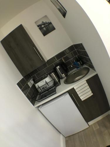 an overhead view of a bathroom with a sink at Parsons Street in Dudley