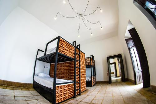 Кровать или кровати в номере Gente de Más Bnb