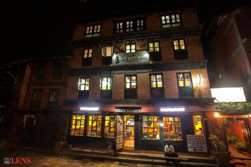 a building with lights on in front of it at night at Shiva Guest House in Bhaktapur