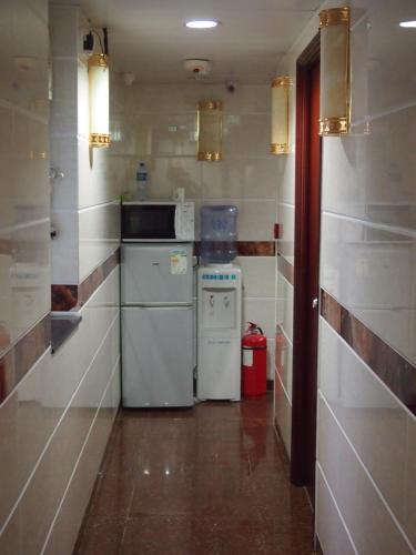 Dapur atau dapur kecil di Traveller's Hostel