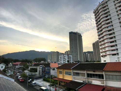 a view of a city with tall buildings at iBook Gurney Suites in George Town
