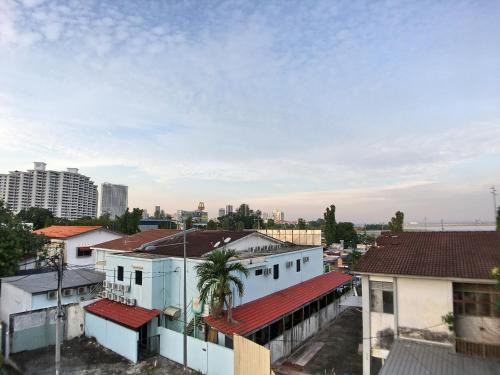a view of a city with buildings at iBook Gurney Suites in George Town