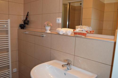 Koupelna v ubytování HOTEL ARÉNA