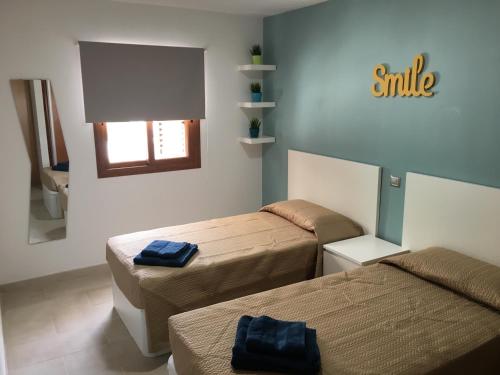 Llit o llits en una habitació de OHMYHOST360 - Dream Home Holidays